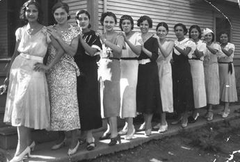 Group of women in dresses from the 1930s